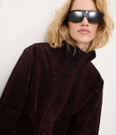 Jaqueta Oversized em Couro com Gola Alta e Barra Ajustada